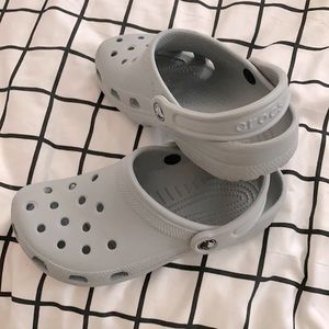 Practically brand new grey crocs, no stains/scuffs